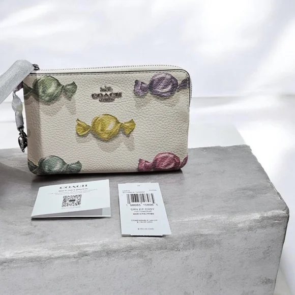 Coach Corner Zip Wristlet in
Candy Print with Charm Refined
Pebble Leather NWT - Picture 4 of 7